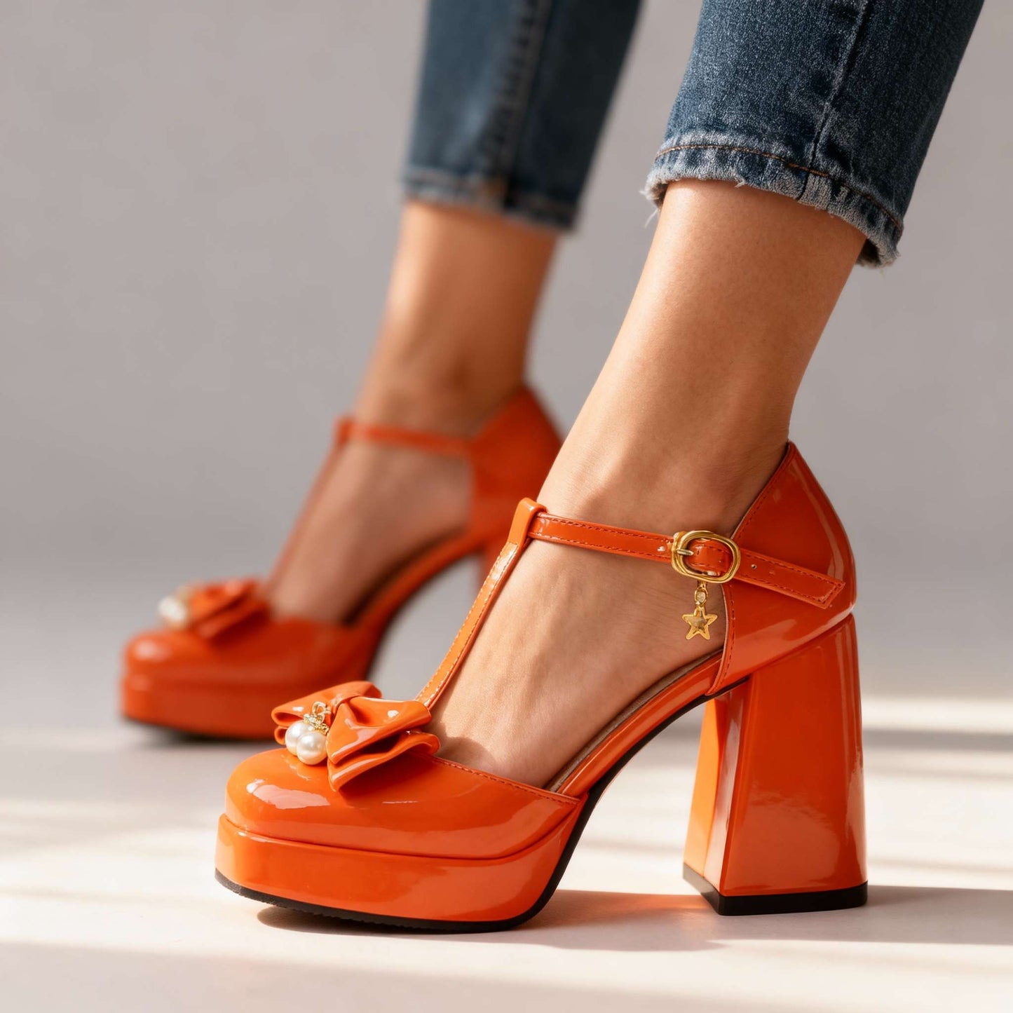 Women's Patent T-Strap Bow Pearl Heels Corvine